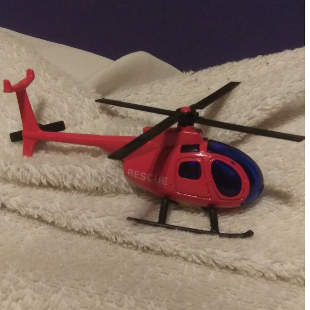 1990s diecast Red Rescue Helicopter. Missing 1 landing leg, antique toy